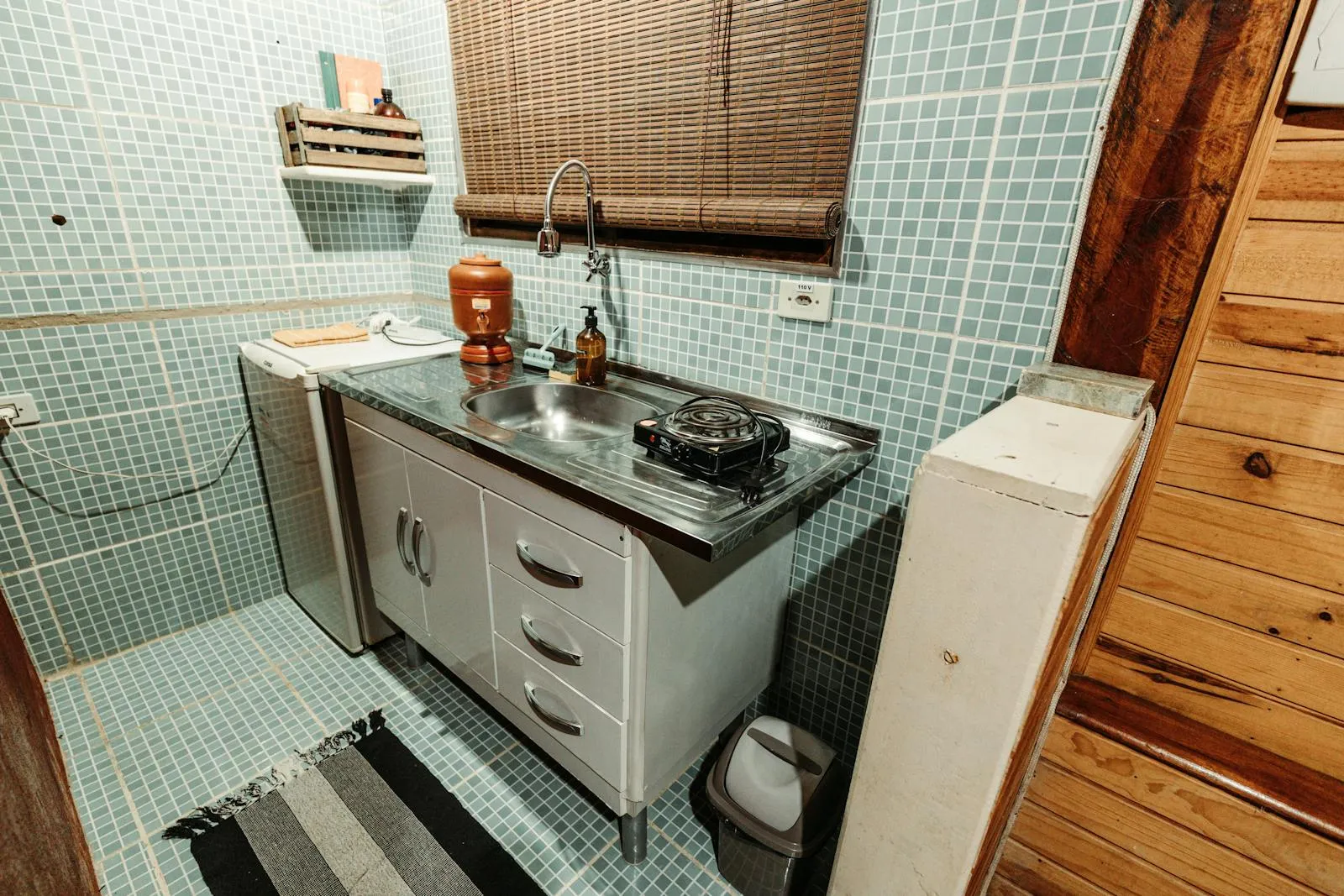 Compact kitchen layout with cabinetry running floor to ceiling, the type of space-efficient design common in Toronto condos and older Ontario homes